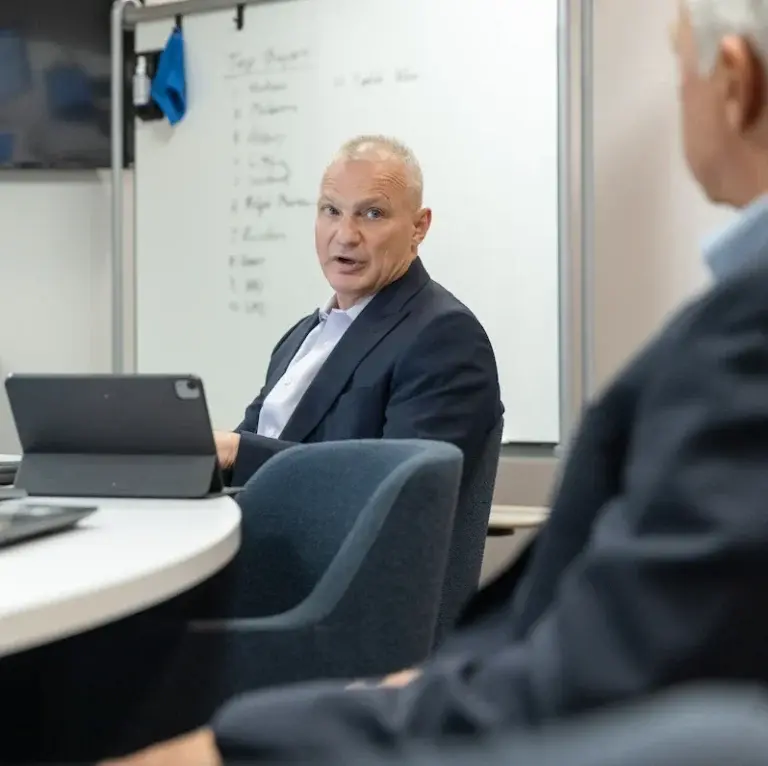 Ozog Consulting Group team members in a strategy meeting